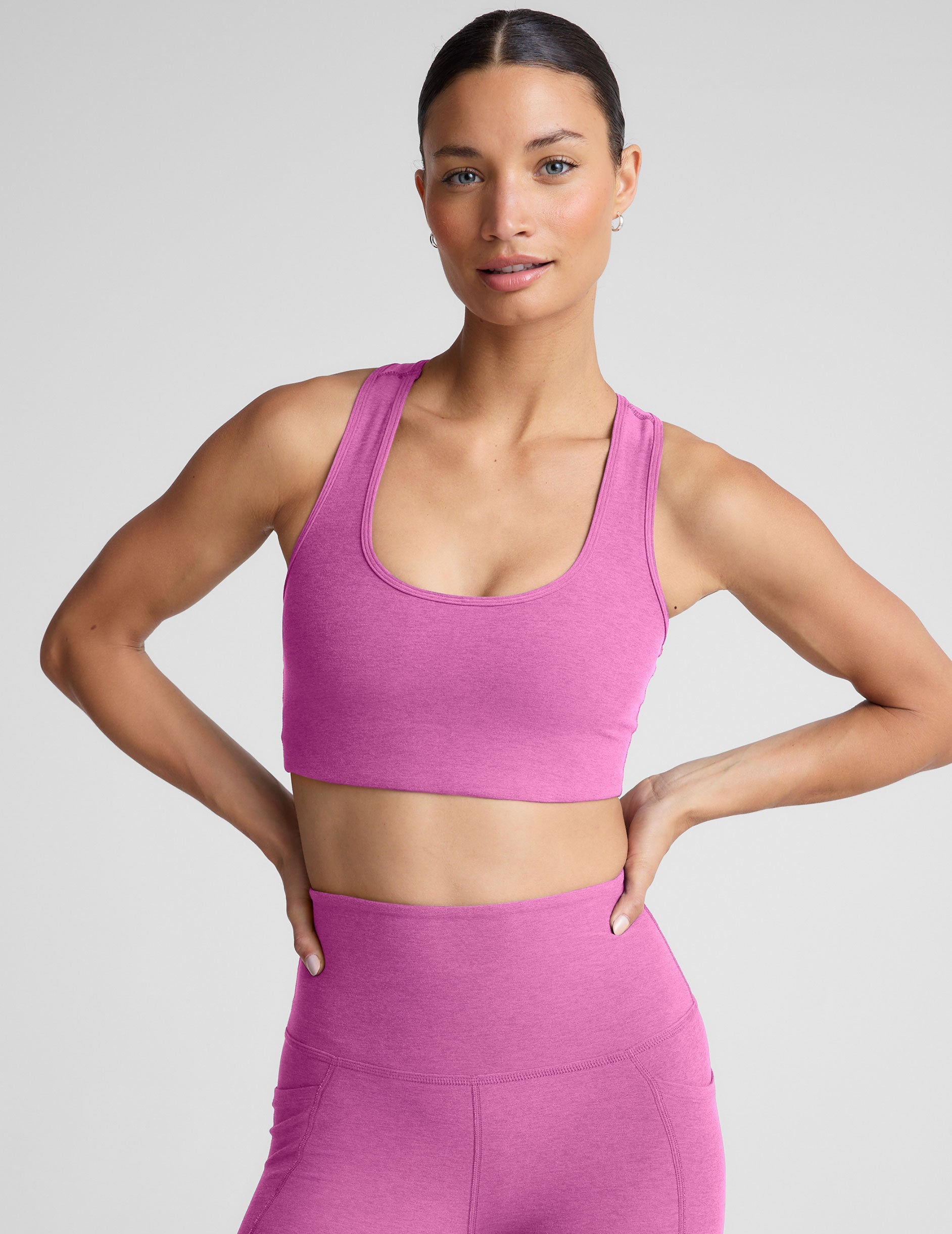 pink medium support racerback bra with a 2" hemband.